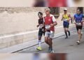 La Colla Tos Pelat de Moncada deja su huella en la media maratón de Xàtiva